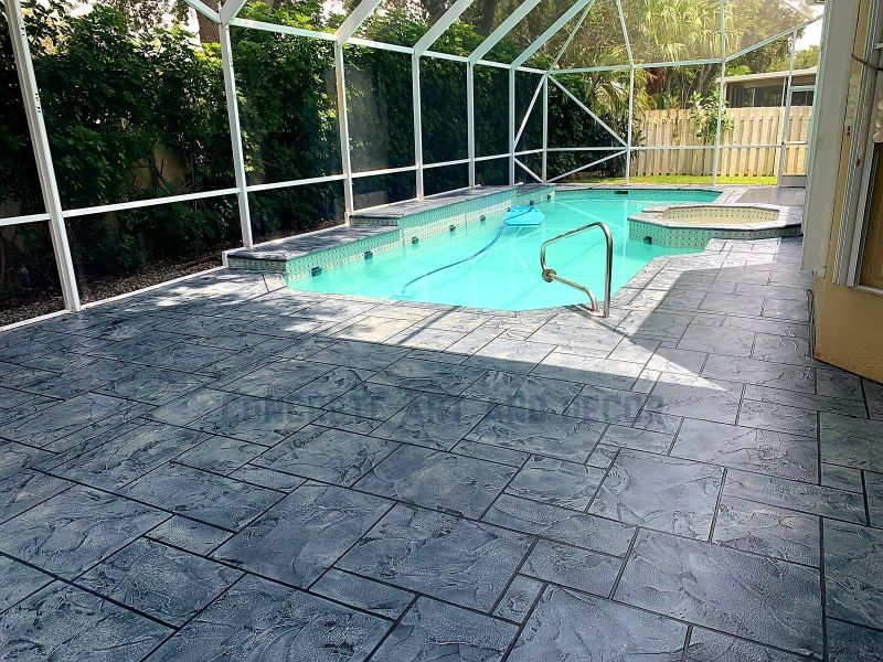gray geometric tile concrete overlay on pool deck