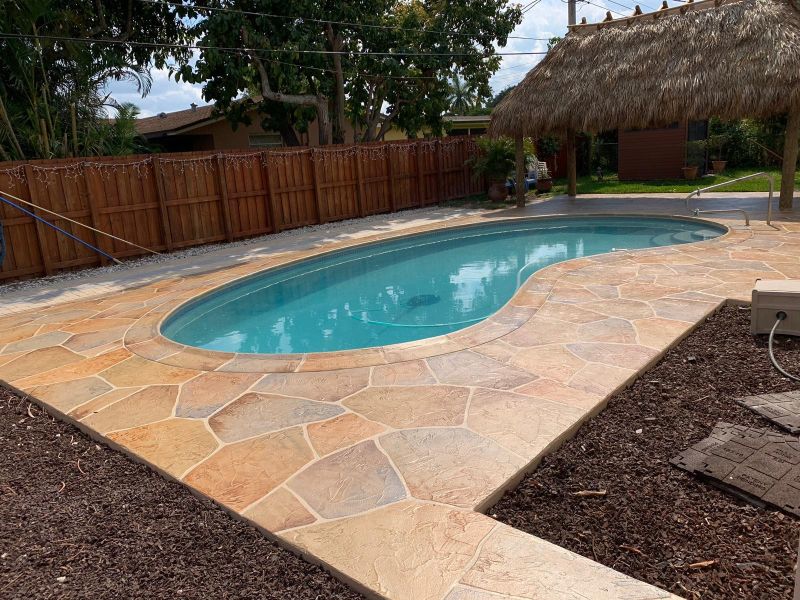 outdoor pool deck completed in stamped concrete