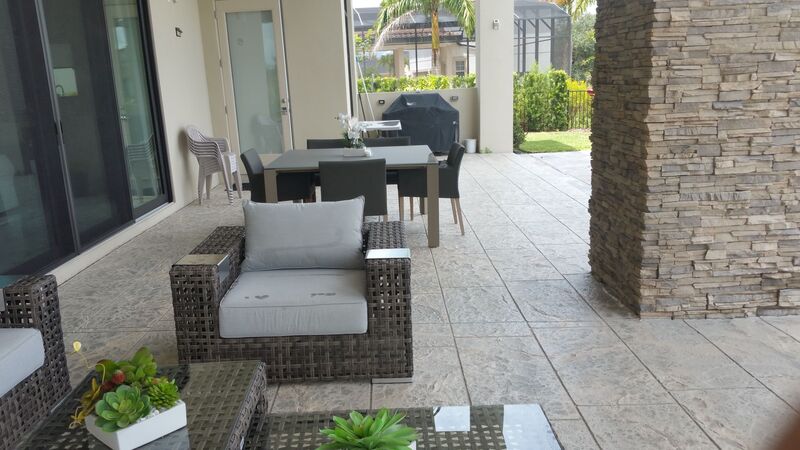 modern patio furniture on concrete patio