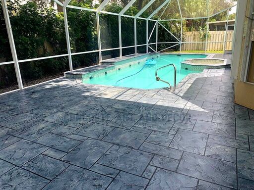dark gray geometric pattern pool deck resurfacing