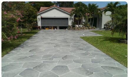 driveway resurfacing in random gray stone pattern