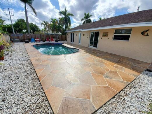 complete pool deck after stamped concrete